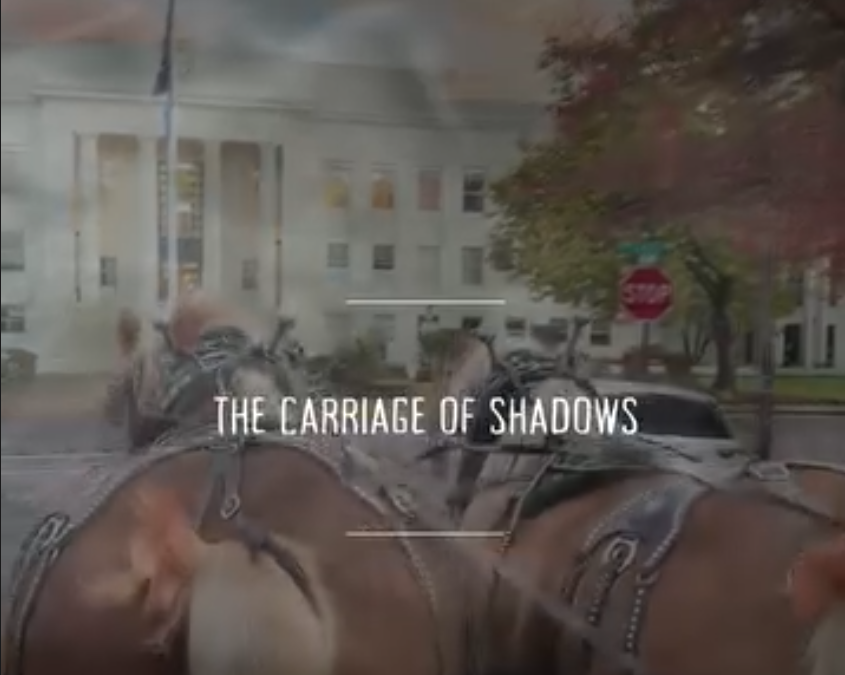 Horse-drawn wagon on a downtown Albany street with the words “The Carriage of Shadows.”
